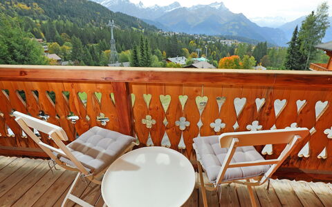 Saint Piran: Plant, Sky, Furniture, Property, Mountain, Table, Nature, Wood, Chair, Outdoor Furniture