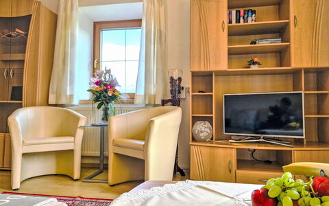 Lueg Ins Land: Furniture, Interior Design, Room, Flooring, Floor, Table, Ceiling, Television, Lighting, Apartment