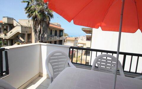 Cava Larica: Property, Umbrella, Building, Apartment, House, Balcony, Shade, Room, Architecture, Real Estate