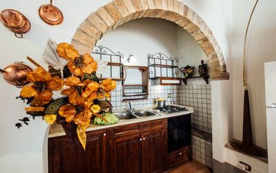 Il Laghetto: Arch, Room, Property, Architecture, Interior Design, Kitchen, Countertop, House, Building, Furniture