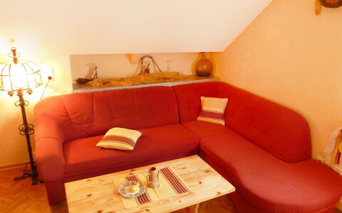 Allmendgasse: Furniture, Couch, Room, Property, Orange, Interior Design, Living Room, Floor, Comfort, Table