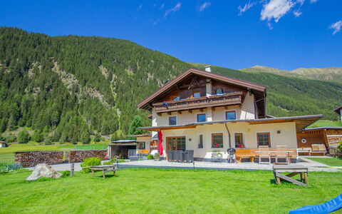Schmittnhof: Sky, Mountain, Plant, Cloud, Building, Window, Ecoregion, Green, Natural Landscape, Land Lot