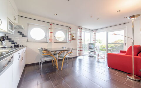 Bredene 300: Table, Couch, Furniture, Property, Cabinetry, Chair, Countertop, Lighting, Wood, Flooring