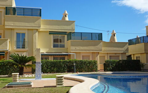 Medina del Sol i: Plant, Sky, Water, Window, Blue, Cloud, Building, Residential Area, Real Estate, Grass