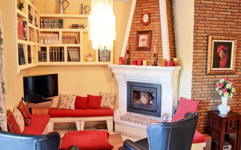 Finca la Poza: Picture Frame, Furniture, Property, Orange, Interior Design, Chair, Living Room, Lighting, Wood, Couch