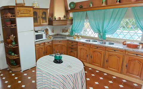 Finca la Poza: Cabinetry, Countertop, Furniture, Property, Houseplant, Drawer, Wood, Kitchen, Interior Design, Lighting