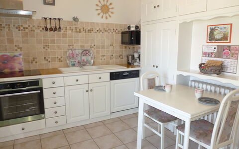 Carpe Diem: Cabinetry, Furniture, Property, Countertop, Table, Building, Kitchen, Wood, Lighting, Drawer