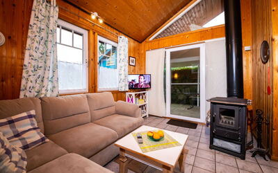 Ferienpark Extertal 130.1: Property, Couch, Window, Building, Table, Wood, Picture Frame, Interior Design, Living Room, Floor