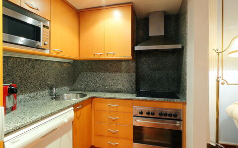 Plaza de Catalunya - Pso. de Gracia: Countertop, Property, Room, Cabinetry, Kitchen, Furniture, Yellow, Interior Design, Building, Tile