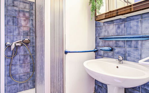 Les Balcons de la Plage: Plumbing Fixture, Sink, Tap, Blue, Purple, Azure, Bathroom, Interior Design, Building, Plant