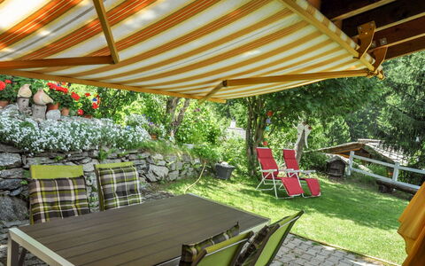 Himmulriich: Plant, Furniture, Property, Table, Chair, Shade, Outdoor Table, Building, Outdoor Furniture, Leisure