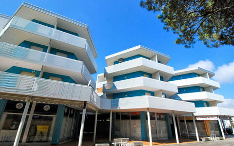Bibione 360: Composite Material, Apartment, Commercial Building, Shade, Condominium, Balcony, Awning, Daylighting, Brutalist Architecture