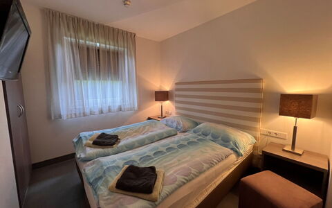 Mountain Resort-Kaprun: Furniture, Comfort, Building, Wood, Bed Frame, Window, Interior Design, Bed, Flooring, Floor