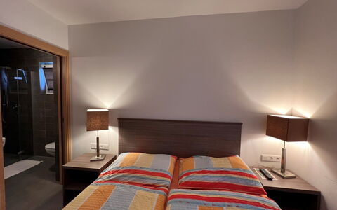 Mountain Resort-Kaprun: Furniture, Building, Property, Comfort, Textile, Wood, Interior Design, Orange, Bed Frame, Lighting