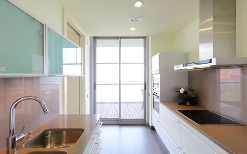 Diagonal Mar: Countertop, Room, Property, Interior Design, Yellow, Green, Sink, Furniture, Building, Floor
