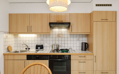 Cornalin 2: Kitchen, Furniture, Cabinetry, Wood, Countertop, Interior Design, Kitchen Appliance, Flooring, Major Appliance, Floor