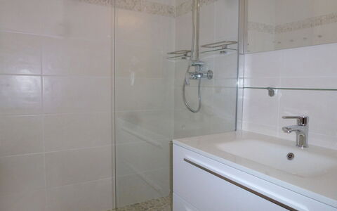 Les Flots: Bathroom, Property, Tile, Room, Tap, Wall, Architecture, Floor, Plumbing Fixture, Marble