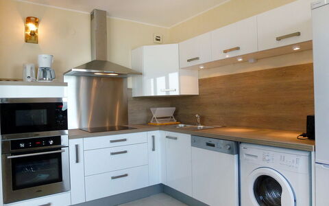 Les Flots: Room, Property, Cabinetry, Kitchen, Countertop, Furniture, Major Appliance, Home Appliance, House, Interior Design