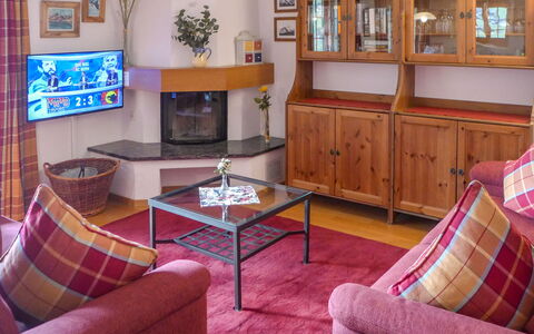 Chalet Nagano: Table, Furniture, Property, Couch, Picture Frame, Cabinetry, Comfort, Television, Wood, Purple