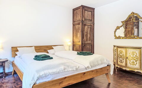 Center: Bed, Bedroom, Bedding, Interior Design, Furniture, Bed Sheet, Flooring, Floor, Wood, Room