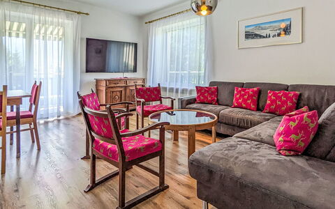 Riki: Furniture, Interior Design, Flooring, Couch, Floor, Room, Living Room, Ceiling, Table, Wood Flooring
