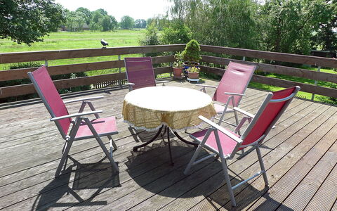 Villa Sorgenfrei: Furniture, Chair, Table, Outdoor Table, Deck, Patio, Folding Chair, Tree, House, Room