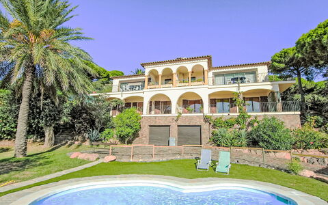 Playa de Aro 511: Plant, Building, Property, Water, Sky, Azure, Tree, Leisure, Arecales, Grass