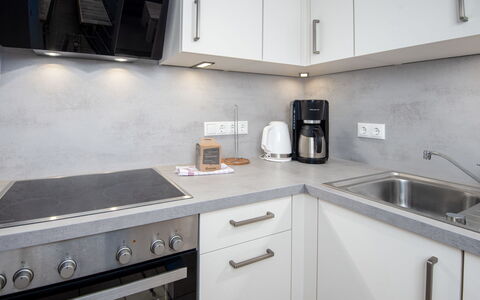 Molenstrasse: Kitchen, Countertop, Kitchen Appliance, Major Appliance, Home Appliance, Cabinetry, Interior Design, Flooring, Kitchen Stove, Stove