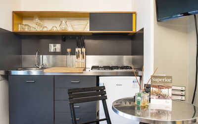 Tipo a 130.2: Cabinetry, Furniture, Countertop, Kitchen Stove, Chair, Kitchen Appliance, Building, Kitchen, Interior Design, Wood
