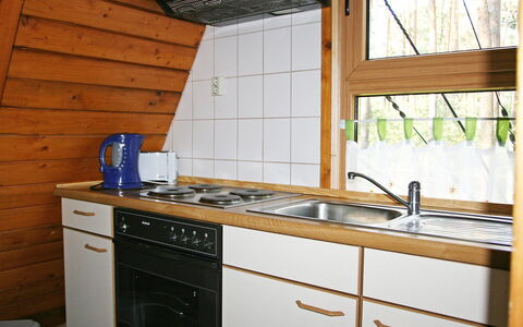 Arendsee 100: Kitchen, Countertop, Room, Cabinetry, Property, Furniture, Kitchen Stove, Tile, Gas Stove, Interior Design