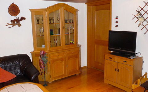 Landhaus Weisser: Furniture, Room, Property, Cabinetry, Interior Design, Building, House, Hardwood, Living Room, Wood