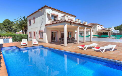 Villa Cala Nova a: Water, Sky, Property, Swimming Pool, Plant, Building, Shade, Outdoor Furniture, Sunlounger, Chair