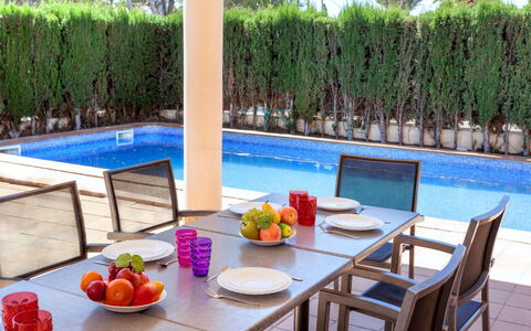 Villa Cala Nova a: Water, Table, Plant, Furniture, Property, Tableware, Chair, Azure, Swimming Pool, Flower