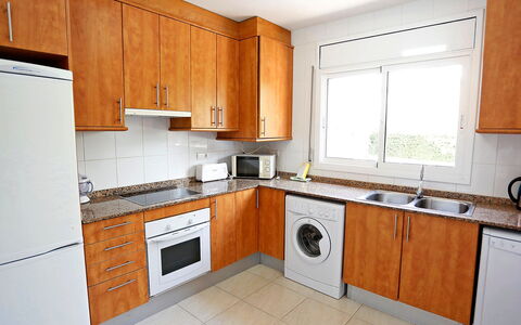 Villa Llobeta: Property, Room, Kitchen, Cabinetry, Countertop, Furniture, Building, Major Appliance, House, Interior Design