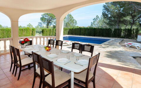 Villa Alguer: Table, Furniture, Property, Chair, Plant, Sky, Shade, Outdoor Furniture, Tree, Water