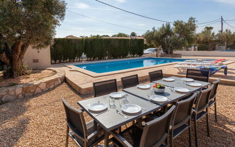 Villa Cala Vidre B: Sky, Table, Furniture, Cloud, Water, Chair, Tree, Outdoor Furniture, Shade, Outdoor Table