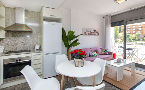 Marina: Table, Plant, Furniture, Property, Couch, Houseplant, Chair, Interior Design, Architecture, Flowerpot