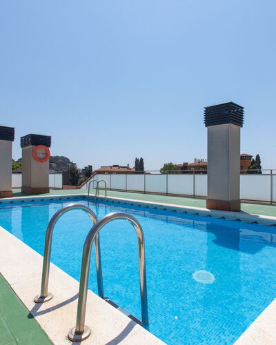 Marina: Water, Sky, Swimming Pool, Building, Flag, House, Leisure, Rectangle, Composite Material, Shade