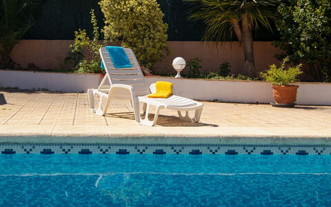Anguilaga: Water, Plant, Furniture, Light, Green, Chair, Azure, Rectangle, Outdoor Furniture, Swimming Pool