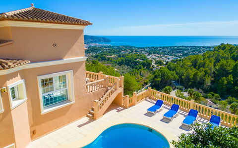 La Perla: Sky, Building, Property, Water, Plant, Blue, Azure, Swimming Pool, Architecture, Tree