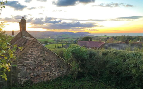 Moonfleat Cottage: Cloud, Sky, Plant, Ecoregion, Natural Landscape, Building, Highland, Grass, Tree, Cumulus