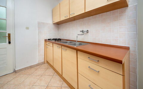 Repak: Cabinetry, Countertop, Furniture, Building, Kitchen, Wood, Drawer, Flooring, Interior Design