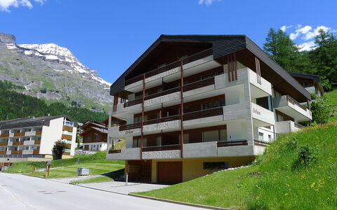 Orion: Cloud, Sky, Plant, Building, Property, Window, Tree, Mountain, Slope, Urban Design