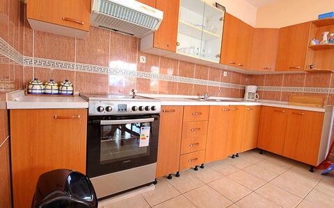 Anderson: Cabinetry, Countertop, Building, Kitchen, Kitchen Appliance, Kitchen Stove, Wood, Interior Design, Major Appliance, Floor
