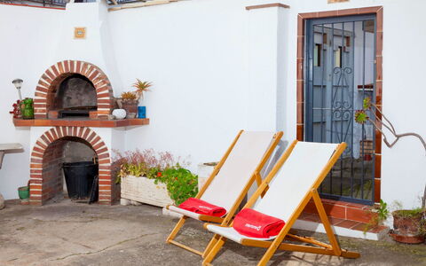 Isis: Plant, Building, Outdoor Furniture, Orange, Wood, Interior Design, House, Shade, Real Estate, Leisure