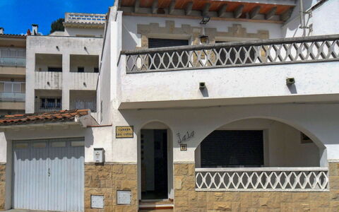 Isis: Sky, Property, Blue, Building, Window, Door, House, Cloud, Wall, Residential Area