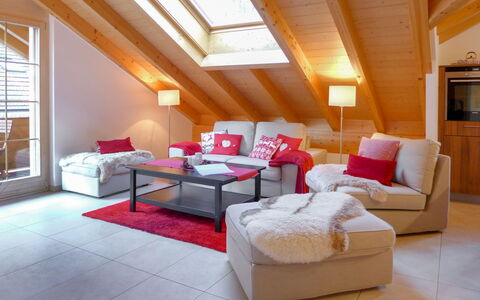 Staubbach: Furniture, Couch, Comfort, Pillow, Window, Lighting, Orange, Interior Design, Wood, Building