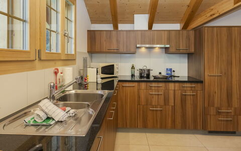 Staubbach: Flooring, Wood, Kitchen, Interior Design, Furniture, Cabinetry, Countertop, Floor, Ceiling, Kitchen Appliance