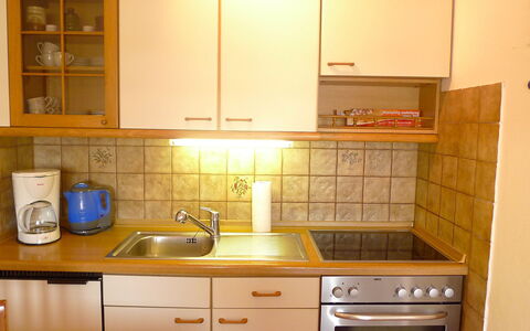 Norderney: Cabinetry, Countertop, Kitchen, Room, Property, Furniture, Tile, Major Appliance, Sink, Cupboard