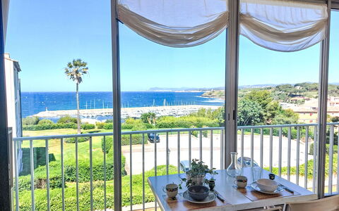 Six Fours la Coudoulière 210: Furniture, Sea, Chair, Shade, Resort, Balcony, Ocean, Coast, Eco Hotel, Kitchen & Dining Room Table